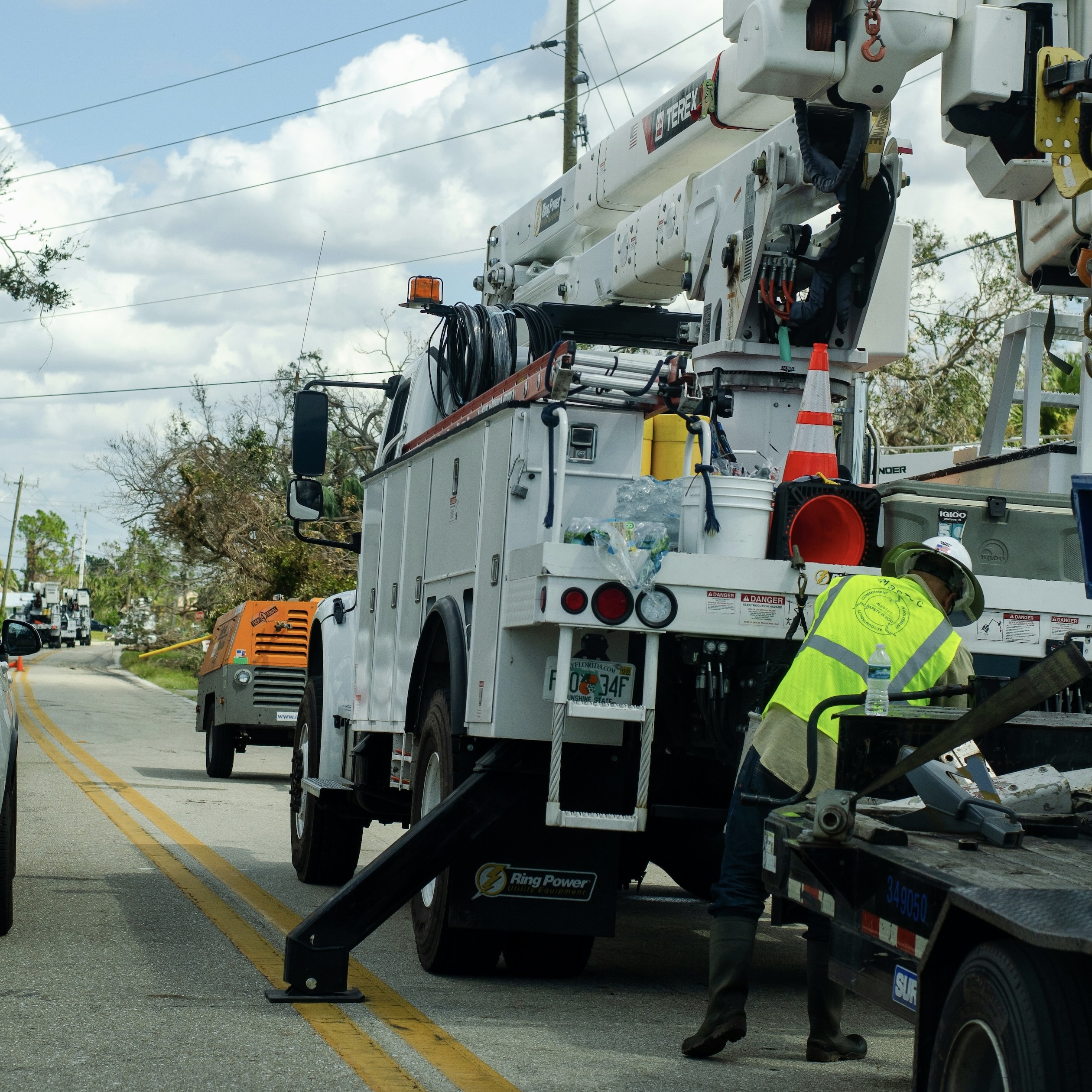 Picture of a utility worker during hurricane season.